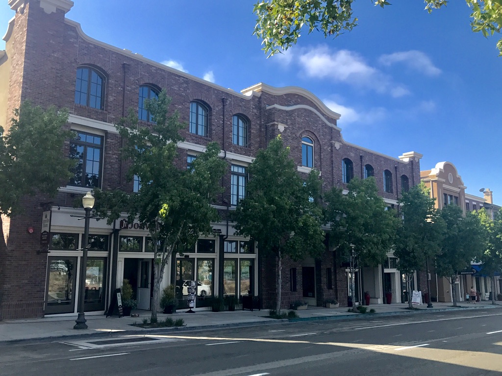 San Elijo Hills town center with outdoor café tables and string lights